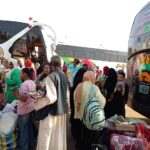 وصول الفوج الرابع من السودانيين العائدين طوعاً من ليبيا إلى بورتسودان